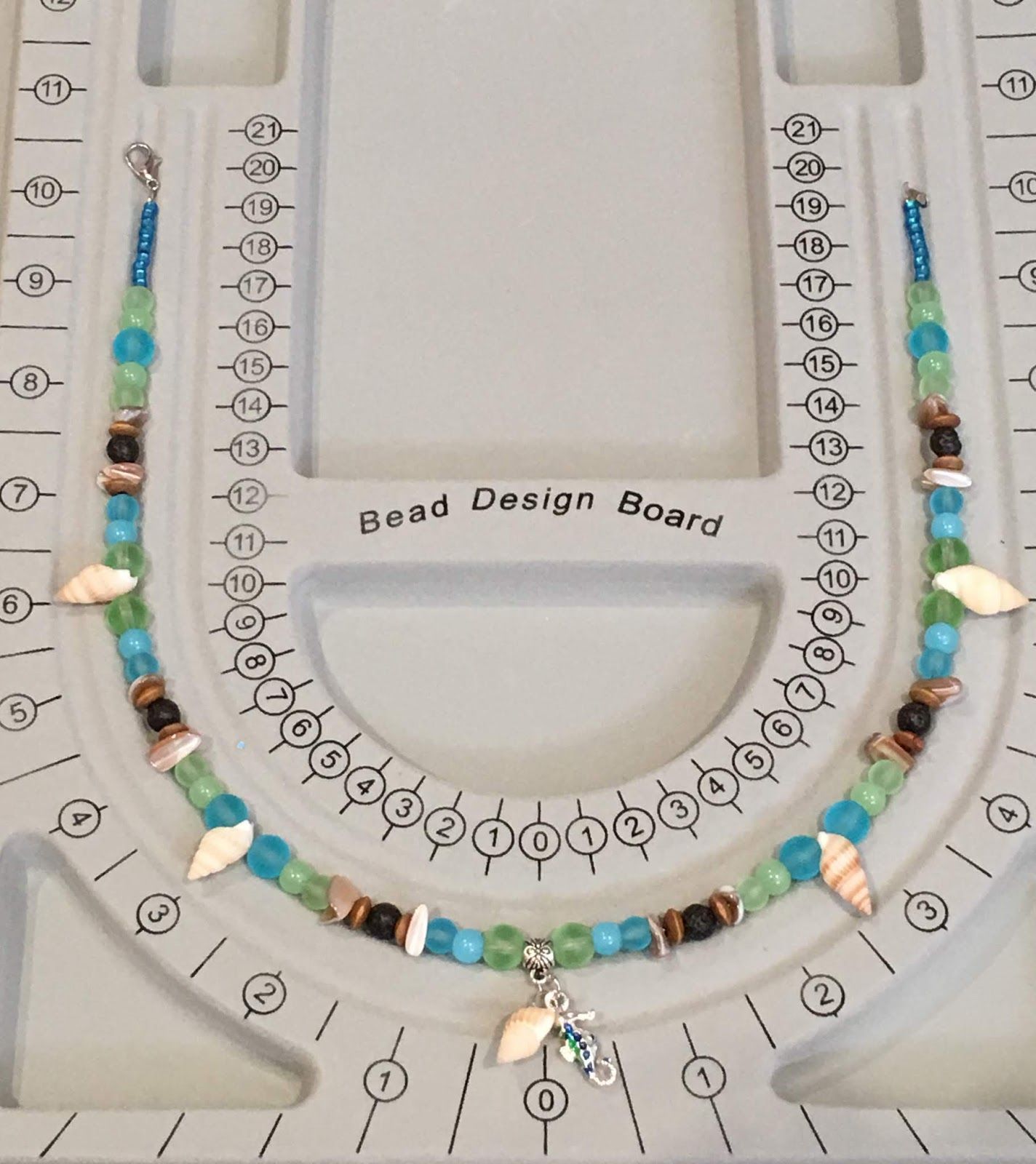 necklace on bead board
